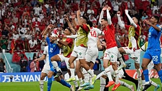 Morocco players celebrate after the World Cup group F soccer match between Belgium and Morocco, at the Al Thumama Stadium in Doha, Qatar, Sunday, Nov. 27, 2022.