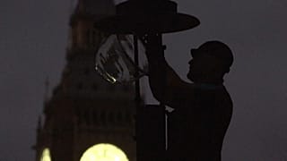 Acendedor de candeeiros nas ruas de Londres