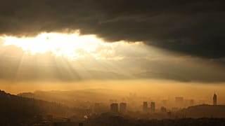 General view of the city during a sunset as smog covers Sarajevo, Bosnia and Herzegovina
