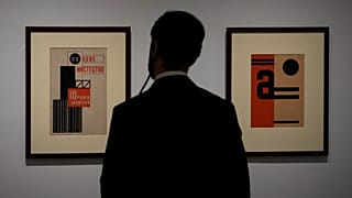 A man looks at artwork by Ukrainian artist Vasyl Yermilov called 'Nove Mystetstvo' during the inauguration of the Ukraine art exposition at the Thyssen-Bornemisza museum.