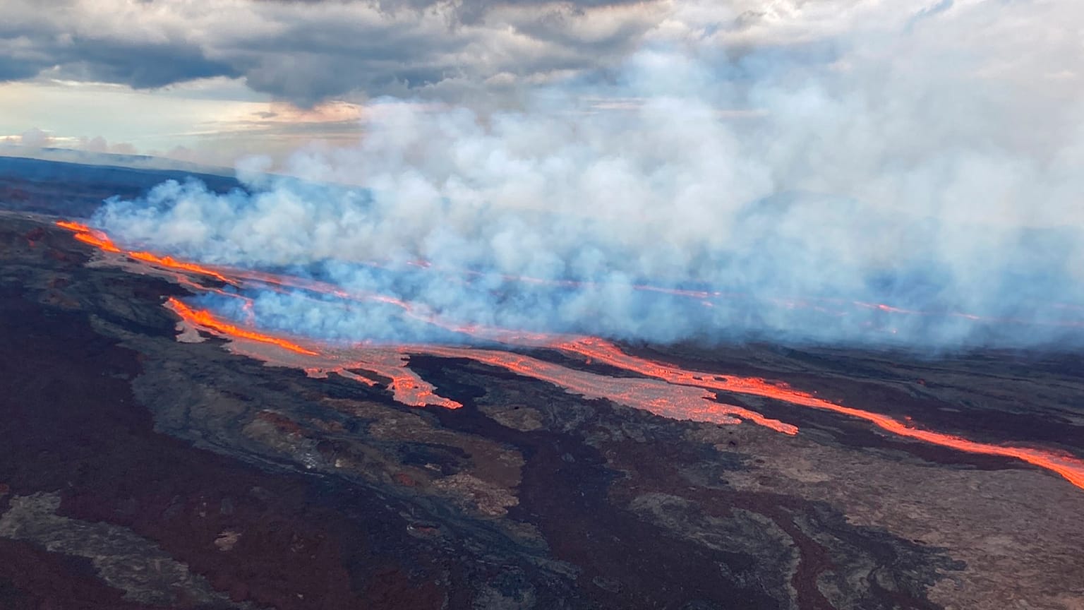 In this aerial photo released by the U.S. Geological Survey, the Mauna Loa volcano is seen erupting from vents on the Northeast Rift Zone on the Big Island of Hawaii, Monday.