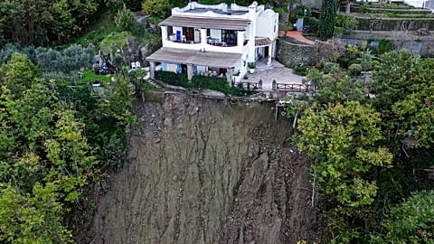 A house is left standing on the edge of a landslide in Casamicciola, on the southern Italian island of Ischia, in this picture taken Sunday, Nov. 27, 2022.