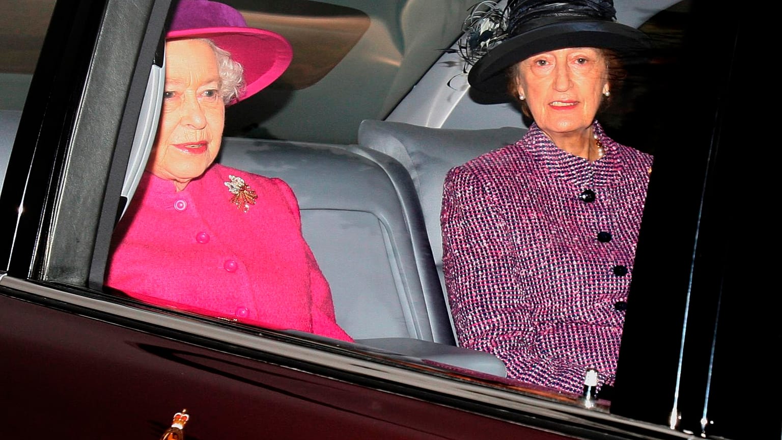 Britain's Queen Elizabeth II, left, and her then lady in waiting, Lady Susan Hussey arriving at St Mary Magdalene Church