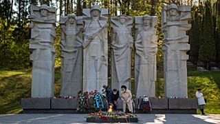 The Antakalnis memorial during the 75th anniversary of the end of World War II celebrations in Vilnius, Lithuania, Saturday, May 9, 2020.