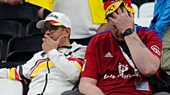 German fan reacts after the World Cup group E soccer match between Costa Rica and Germany,  Qatar, Friday, Dec. 2, 2022.