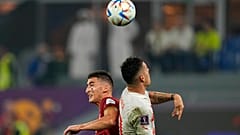 Serbia's Filip Duricic, left, and Switzerland's Granit Xhaka go for a header during the World Cup group G soccer match between Serbia and Switzerland.