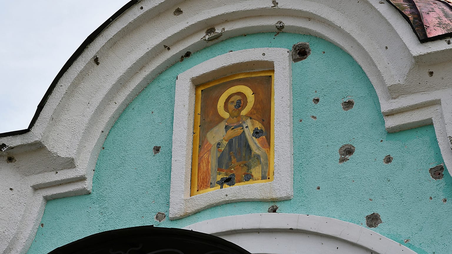 An Orthodox icon is seen on a damaged church in the retaken village of Bohorodychne, eastern Ukraine, 22 October 2022