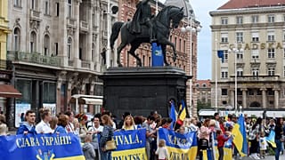 Demonstrators gather on Ukraine's Day of the National Flag on Ban Jelacic Square in central Zagreb.