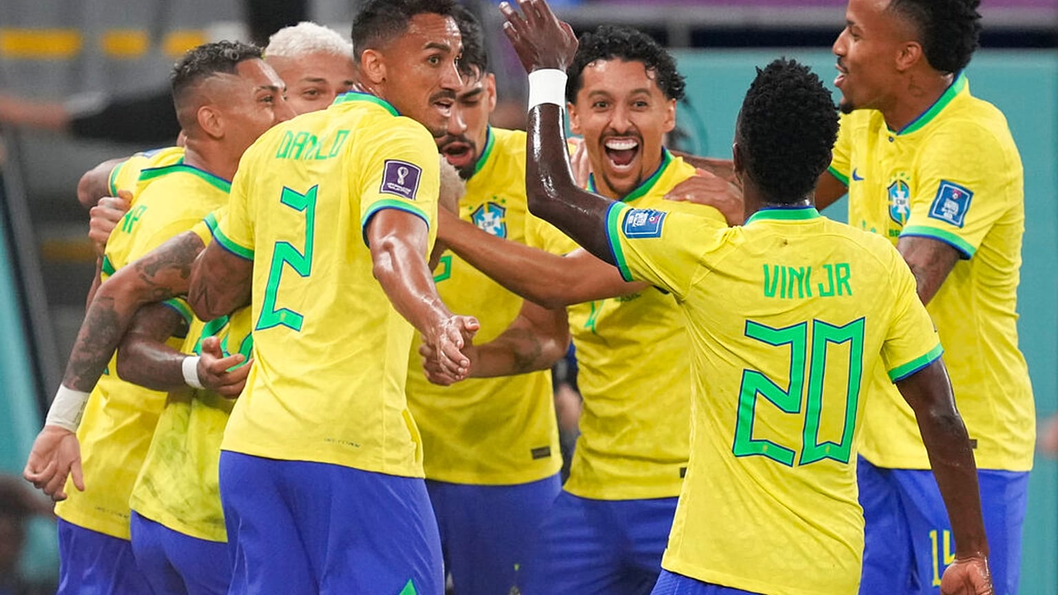 Brazil's players celebrate at the end of the World Cup round of 16 soccer match between Brazil and South Korea, at the Stadium 974 in Doha, Qatar, Monday, Dec. 5, 2022