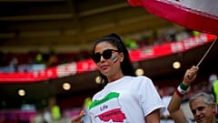 A football fan wears a T-shit demanding freedom for women in Iran in memory of Mahsa Amini at the Ahmad Bin Ali Stadium in Al Rayyan , Qatar, Friday, Nov. 25, 2022.
