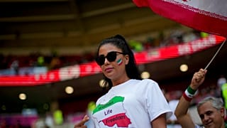 A football fan wears a T-shit demanding freedom for women in Iran in memory of Mahsa Amini at the Ahmad Bin Ali Stadium in Al Rayyan , Qatar, Friday, Nov. 25, 2022.