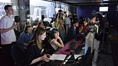 Journalists work in a news room of the Dozhd (Rain) TV channel in Moscow, Russia, Friday, Aug. 20, 2021. AP Photo/Denis Kaminev