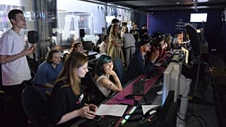 Journalists work in a news room of the Dozhd (Rain) TV channel in Moscow, Russia, Friday, Aug. 20, 2021. AP Photo/Denis Kaminev