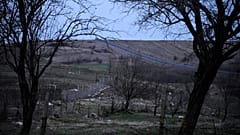 Wire border fence is seen from the village of Shtit in Bulgaria, near the border with Turkey.
