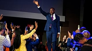 Democratic Sen. Raphael Warnock speaks during an election night watch party, Tuesday, Dec. 6, 2022, in Atlanta.