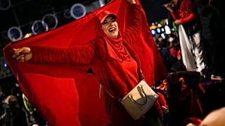 Morocco fans in Marseille, southern France, celebrate after victory over Spain in the Qatar World Cup.