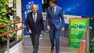Canadian Prime Minister Justin Trudeau, right, greets Secretary-General of the United Nations Antonio Guterres as they hold a bilateral meeting in Montreal