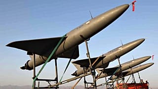 In this photo released by Iranian Army on Aug. 24, 2022, drones are prepared for launch during a military drone drill in Iran.