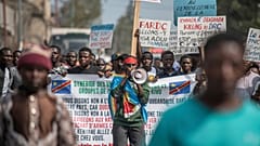 Goma residents join in a protest called by the civil society against the United Nations peacekeeping force and fighting factions, Goma, Dec. 1, 2022. 