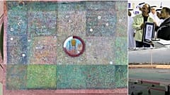 Artist Emad Salehi being presented with Guinness World Record for the largest painting (on the right, above)