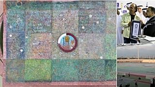 Artist Emad Salehi being presented with Guinness World Record for the largest painting (on the right, above)