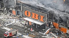 Russia firefighters battle a massive blaze which broke out overnight at the Mega Khimki shopping centre 