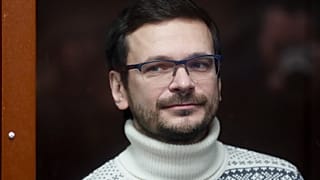 Russian opposition activist and former municipal deputy of the Krasnoselsky district Ilya Yashin inside a glass cubicle prior to a court hearing in Moscow, Dec. 9, 2022.