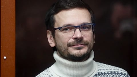 Russian opposition activist and former municipal deputy of the Krasnoselsky district Ilya Yashin inside a glass cubicle prior to a court hearing in Moscow, Dec. 9, 2022.