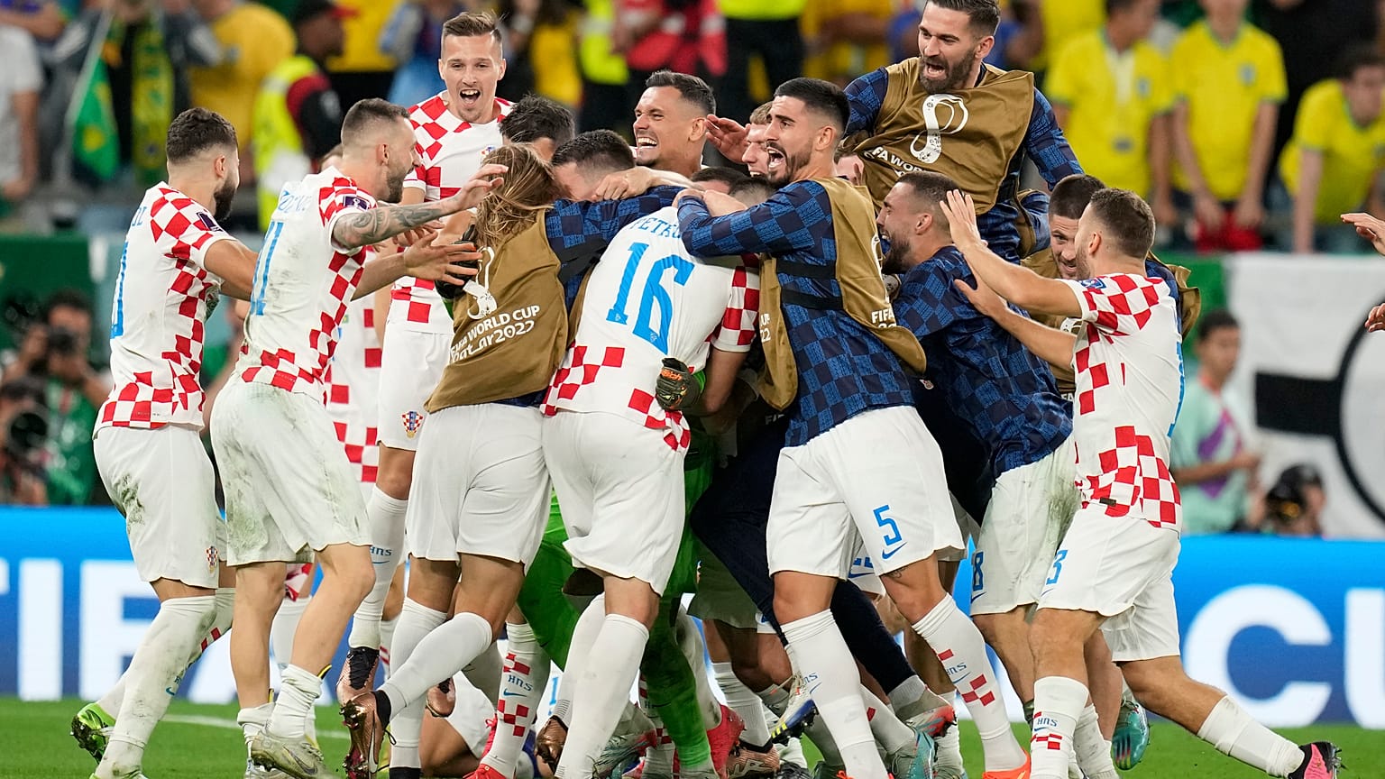 Croatia team celebrate after the World Cup quarterfinal match between Croatia and Brazil, at the Education City Stadium in Al Rayyan, Qatar, Friday, Dec. 9, 2022. 