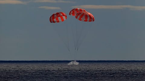 the Orion spacecraft for the Artemis I mission splashes down in the Pacific Ocean after a 25.5 day mission to the Moon, Sunday, Dec. 11, 2022