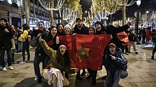 احتفال بفوز المغرب في الشانزليزيه، باريس- 2022.