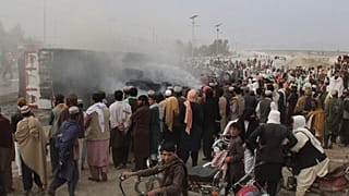 Locals gathered at the Chaman border crossing to see the damage for themselves
