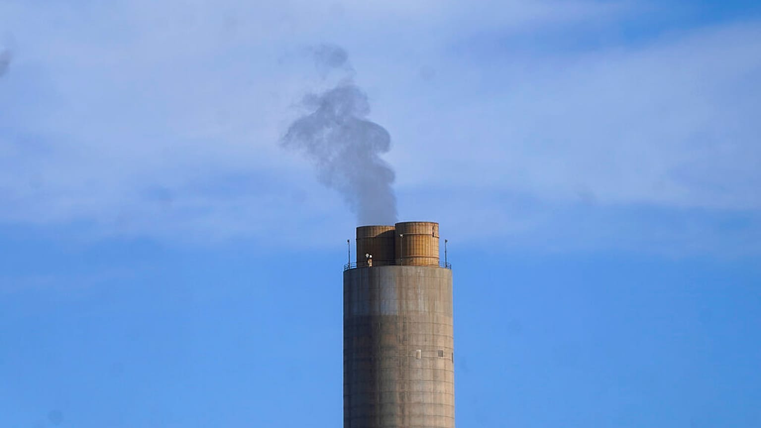 A smokestack stands at a coal plant on June 22, 2022, in Delta, Utah. 