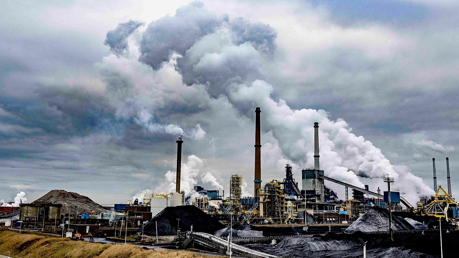 The blast furnaces of Tata Steel seen from the beach in Wijk aan Zee, Netherlands.