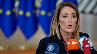 European Parliament President Roberta Metsola speaks with the media as she arrives for an EU summit in Brussels, Thursday, Dec. 15, 2022.