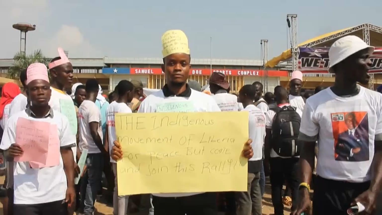 Liberian protester holds sign at demonstration on 17 December 2022