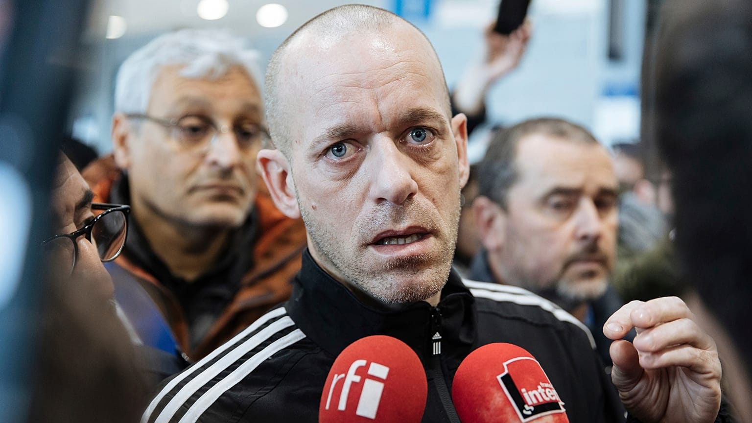 Palestinian French lawyer and activist Salah Hammouri talks with the press as he arrives at the Charles de Gaulle Airport after his extradition from Israel to France, Sunday, 