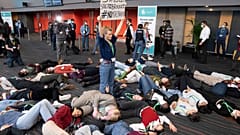Members of the Global Youth Biodiversity Network demonstrate in the halls of the COP15 convention centre 