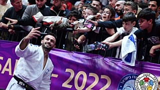 Baruch Shmailov poses with fans