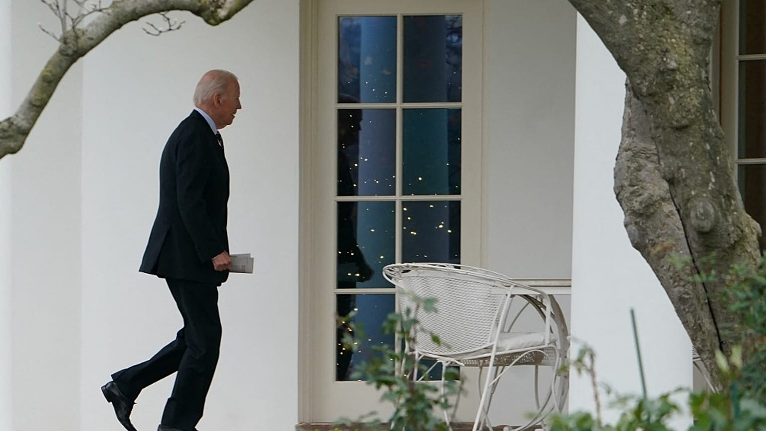 Biden walks to the Oval Office upon arrival on the South Lawn of the White House in Washington, DC on December 16, 2022.