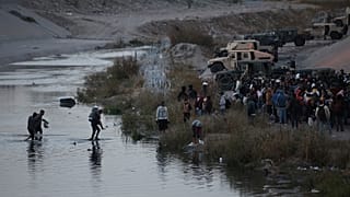 Flüchtlinge überqueren den Rio Grande, an der Grenze zu den USA in Ciudad Juarez, Mexiko