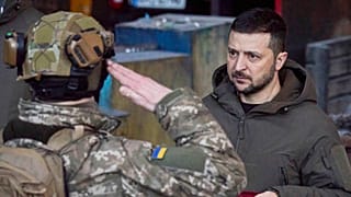 Ukrainian President Volodymyr Zelenskyy awards a serviceman at the site of the heaviest battles with the Russian invaders in Bakhmut, 20 December 2022
