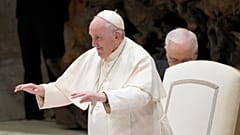 Pope Francis arrives for an audience with Vatican's employees in the Paul VI Hall, at the Vatican, 22 December 2022