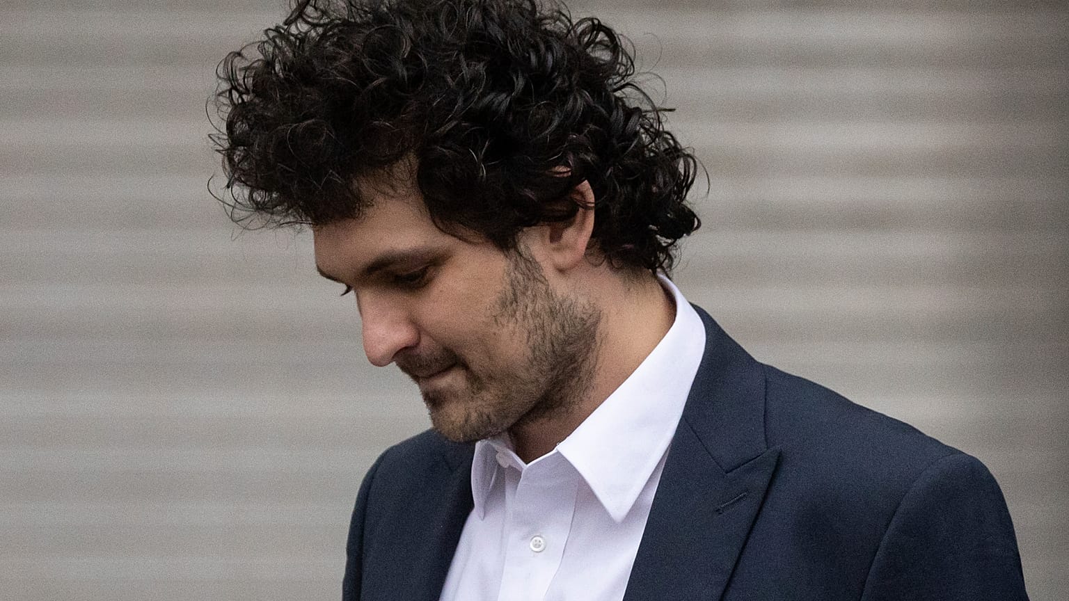 FTX founder Sam Bankman-Fried leaves court following his extradition to the US, Thursday, Dec. 22, 2022, 