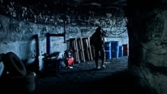 A Ukrainian soldier walks in an underground command center in Bakhmut, Donetsk region, Ukraine, Sunday, Dec. 25, 2022. 