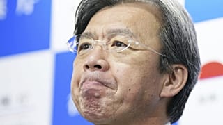 Kenya Akiba, ministre japonais de la Reconstruction, lors d'une conférence de presse à Tokyo, le 27 décembre 2022