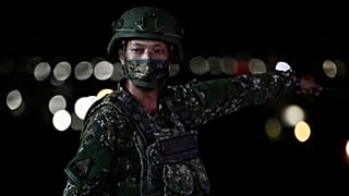 Archives : soldat taiwanais lors de manœuvres dans le comté de Pingtung dans le sud de Taiwan, le 6 septembre 2022