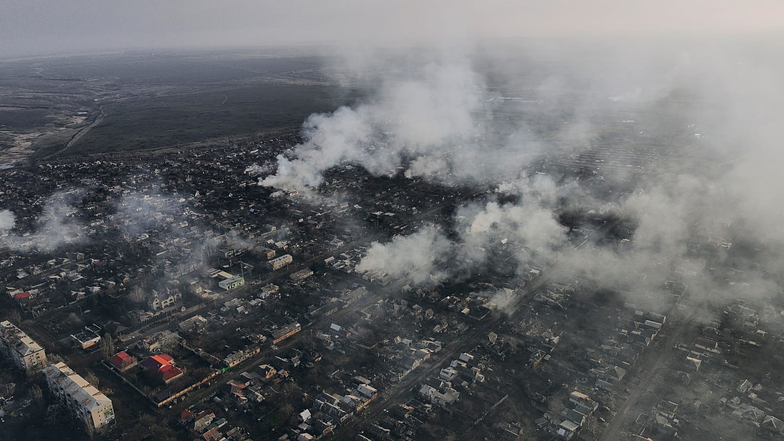 Smoke billows after Russian attacks in the outskirts of Bakhmut, Ukraine, Tuesday, Dec. 27, 2022.