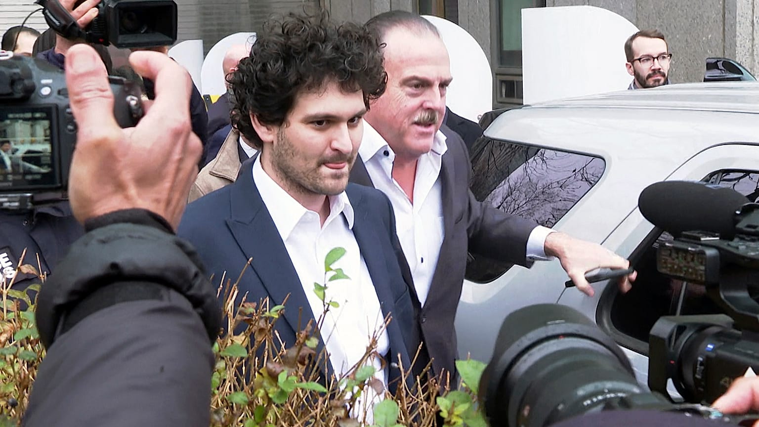 Cryptocurrency entrepreneur Sam Bankman-Fried leaves Manhattan federal court on bail ,Thursday, Dec. 22, 2022 in New York.