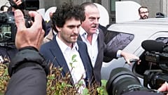 Cryptocurrency entrepreneur Sam Bankman-Fried leaves Manhattan federal court on bail ,Thursday, Dec. 22, 2022 in New York.